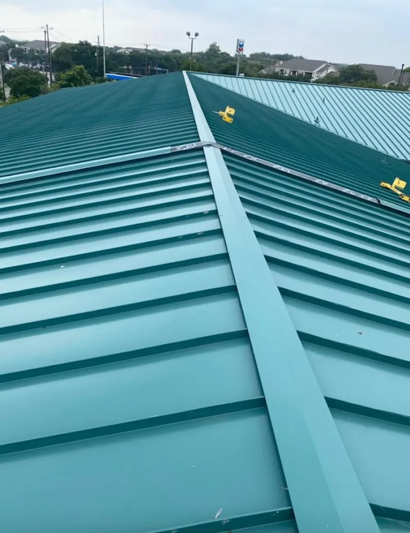 Green commercial metal roof ridge and valley for Metal Roof Repair in Corvallis
